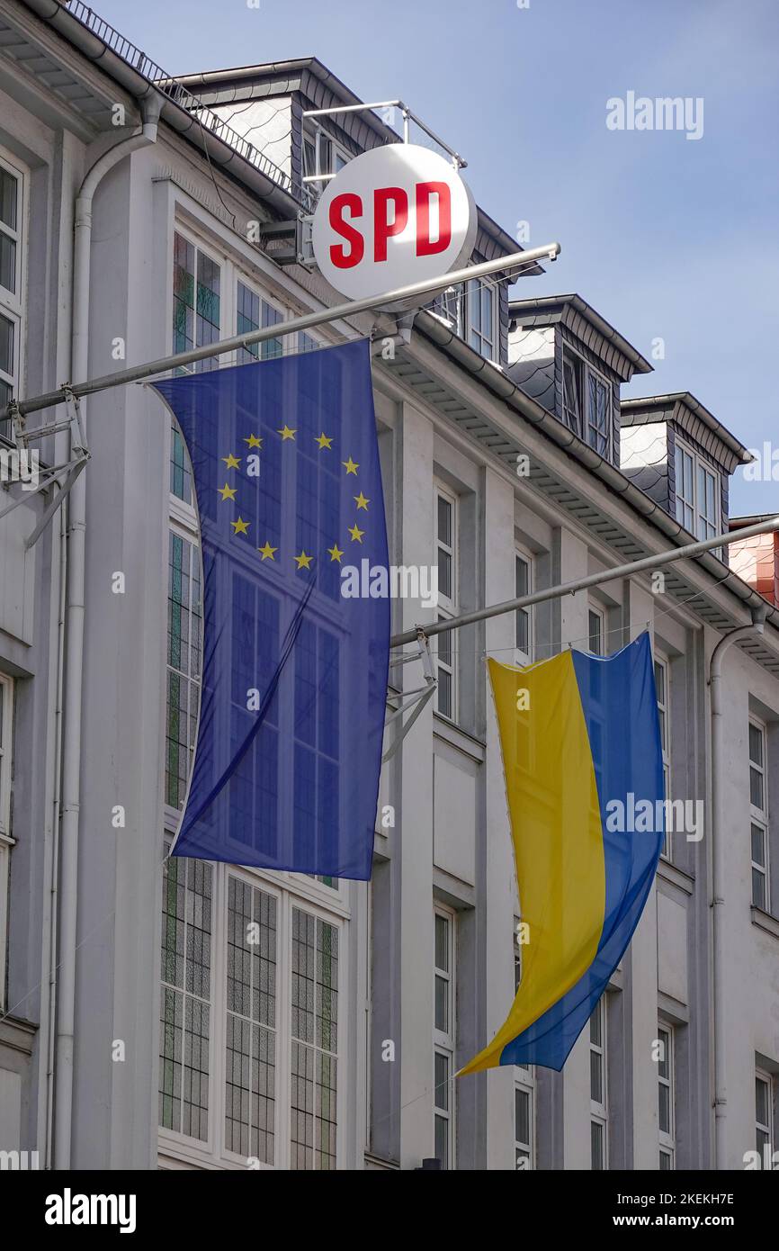Flags of EU and Ukraine outside SPD building in Hannover, Germany Stock Photo