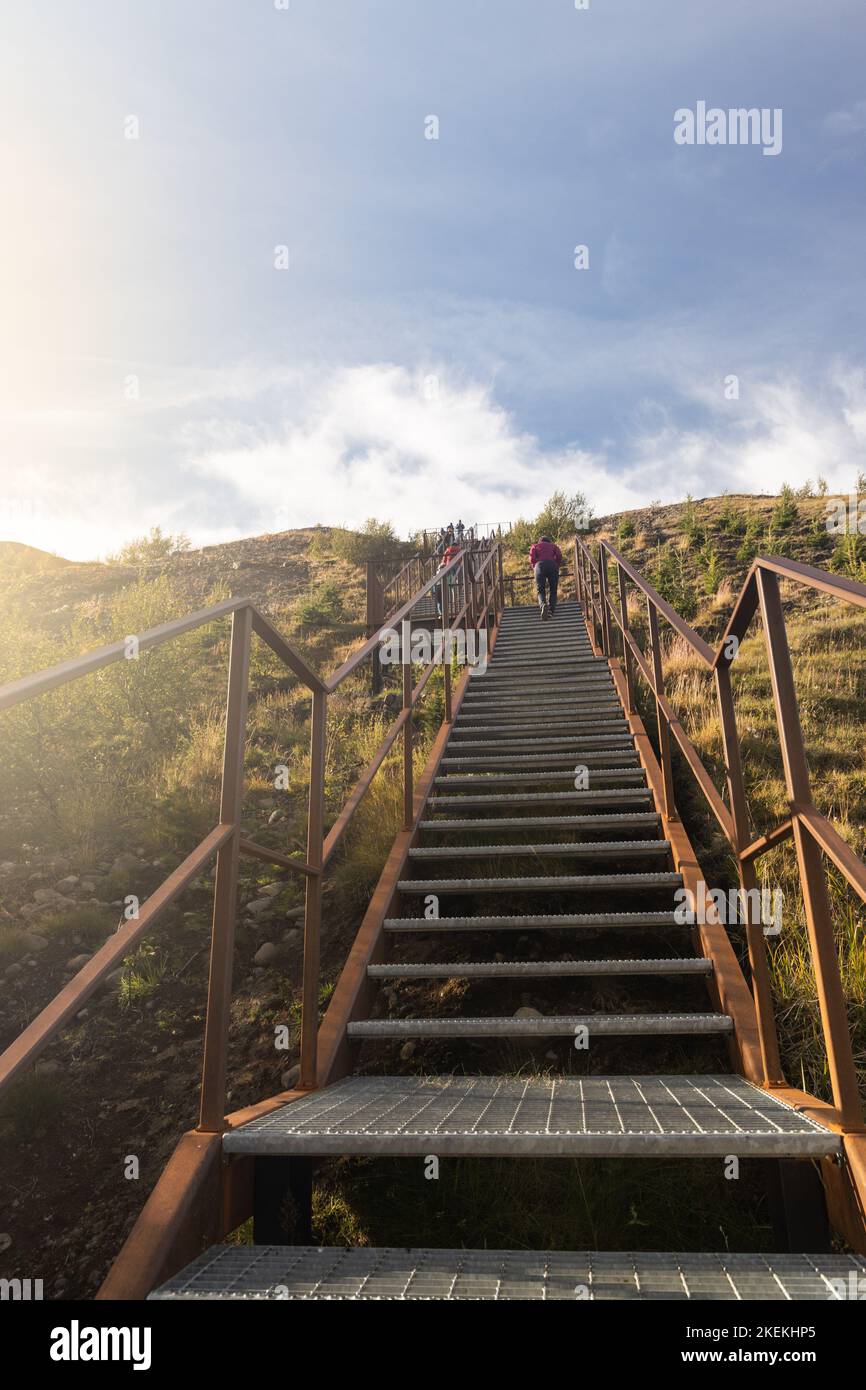 Steep stairs to the Studlagil observatory viewpoint in Iceland, known for its columnar basalt rock formations and the blue-green water that runs Stock Photo