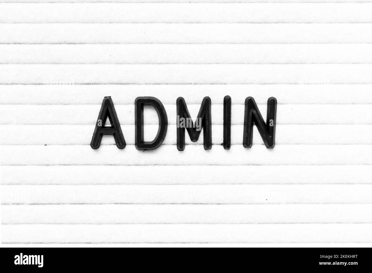 Black color letter in word admin on white felt board background Stock Photo