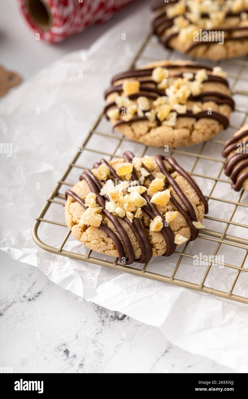 Candied ginger cookies drizzled with chocolate glaze Stock Photo Alamy