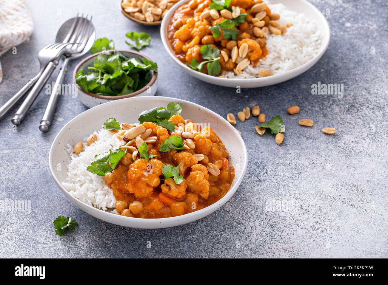 Vegan curry with cauliflower, chickpeas and butternut squash Stock ...