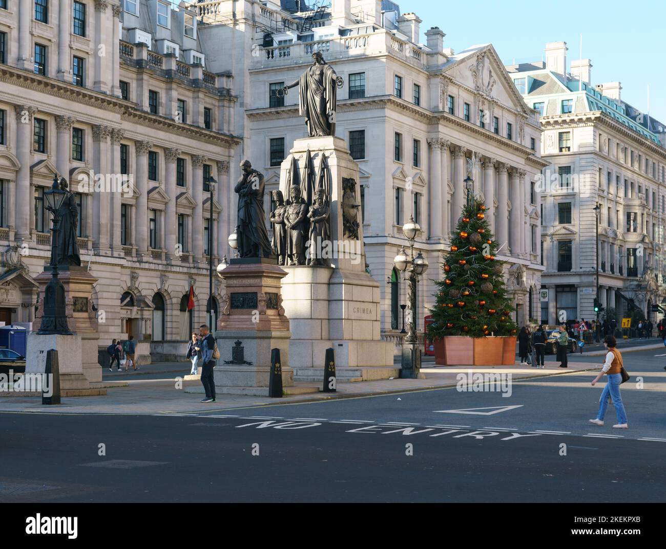 The Guards Crimean War Memorial in Waterloo Place, London, flanked by