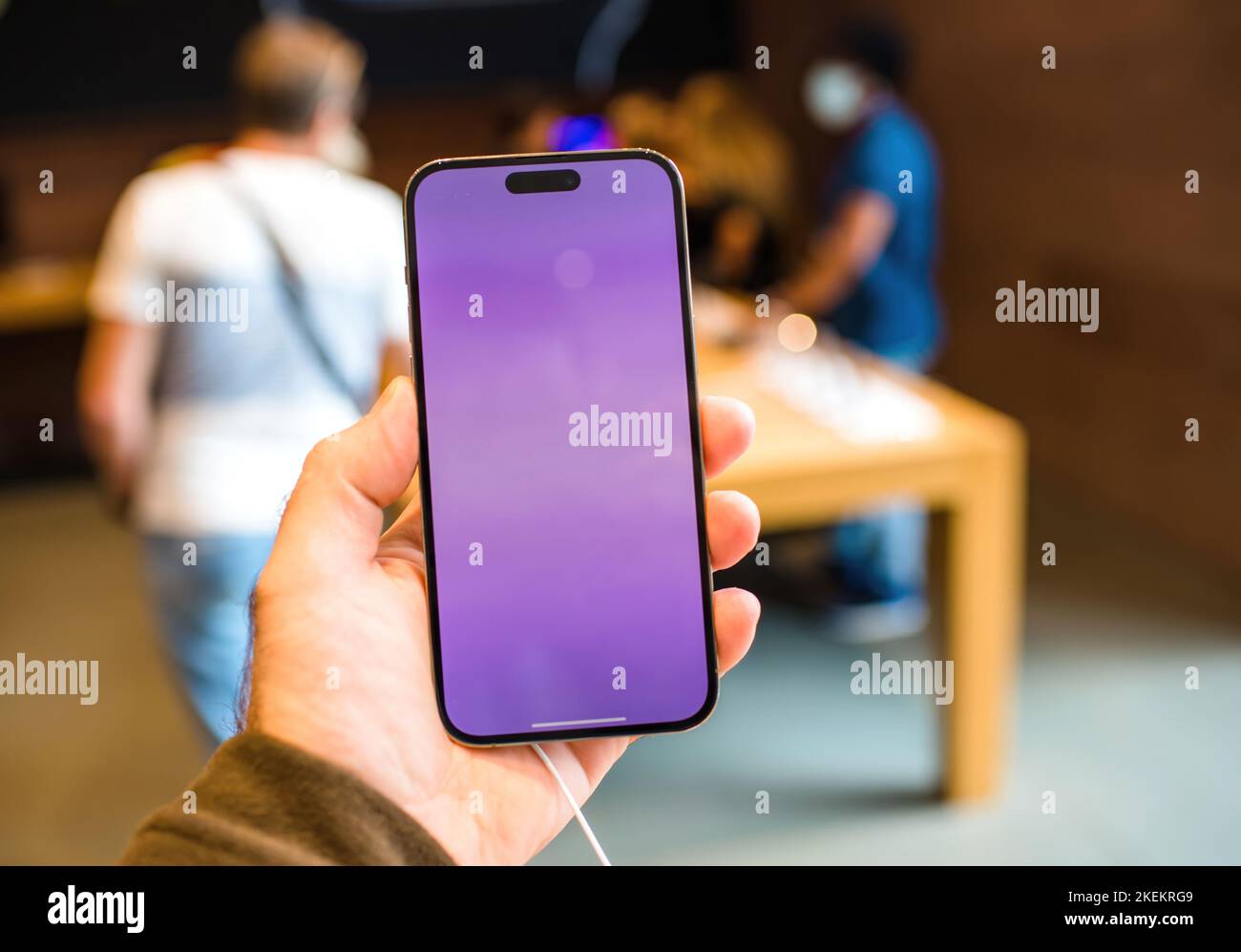 Paris, France - Oct 28, 2022: Male hand holding iPhone 14 Pro new ...