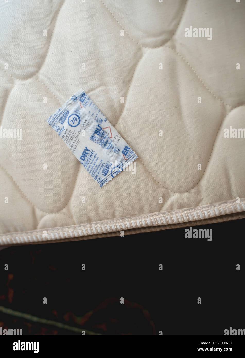 Copenhagen Denmark - Oct 25, 2022: desiccant on new mattress hygroscopic substance that is used to induce or sustain a state of dryness in its vicinity Stock Photo