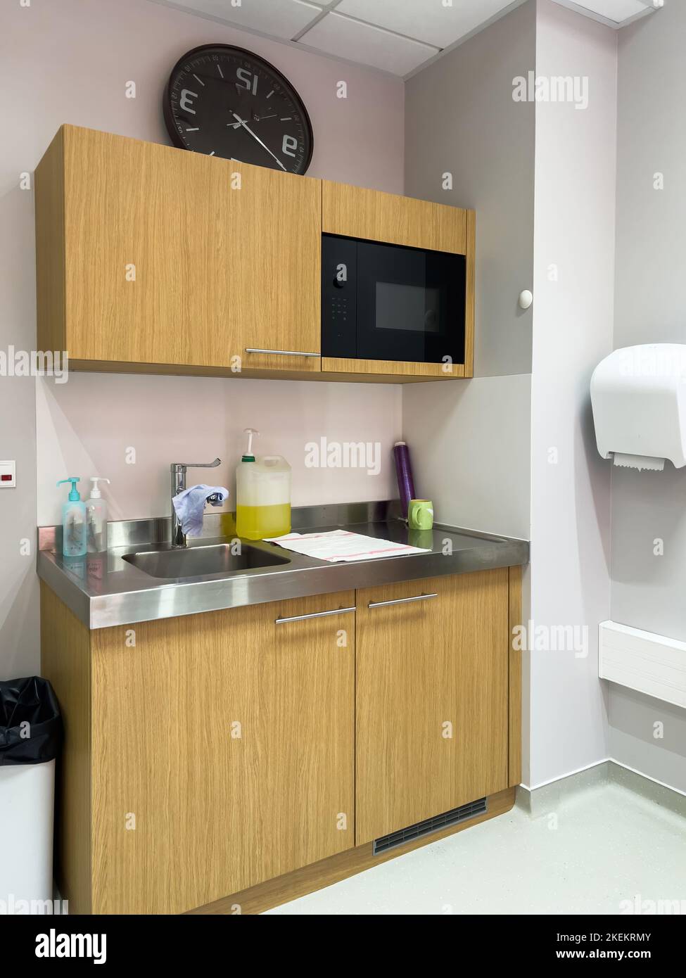 Modern small kitchenette with microwave oven inside hospital waiting