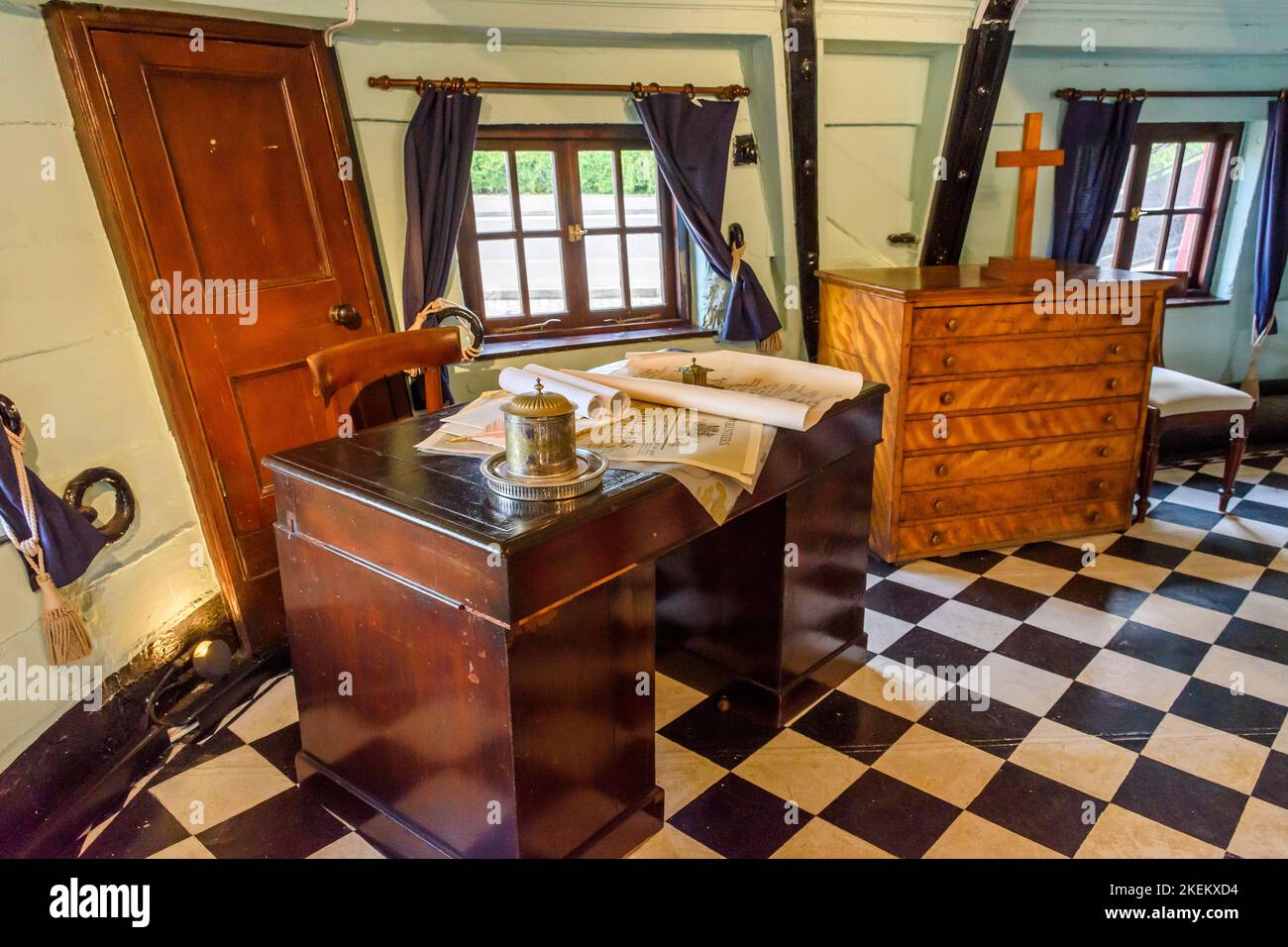 Writing desk in the captain's cabin on the frigate HMS Unicorn.  West Victoria Dock, Dundee, Scotland, UK Stock Photo