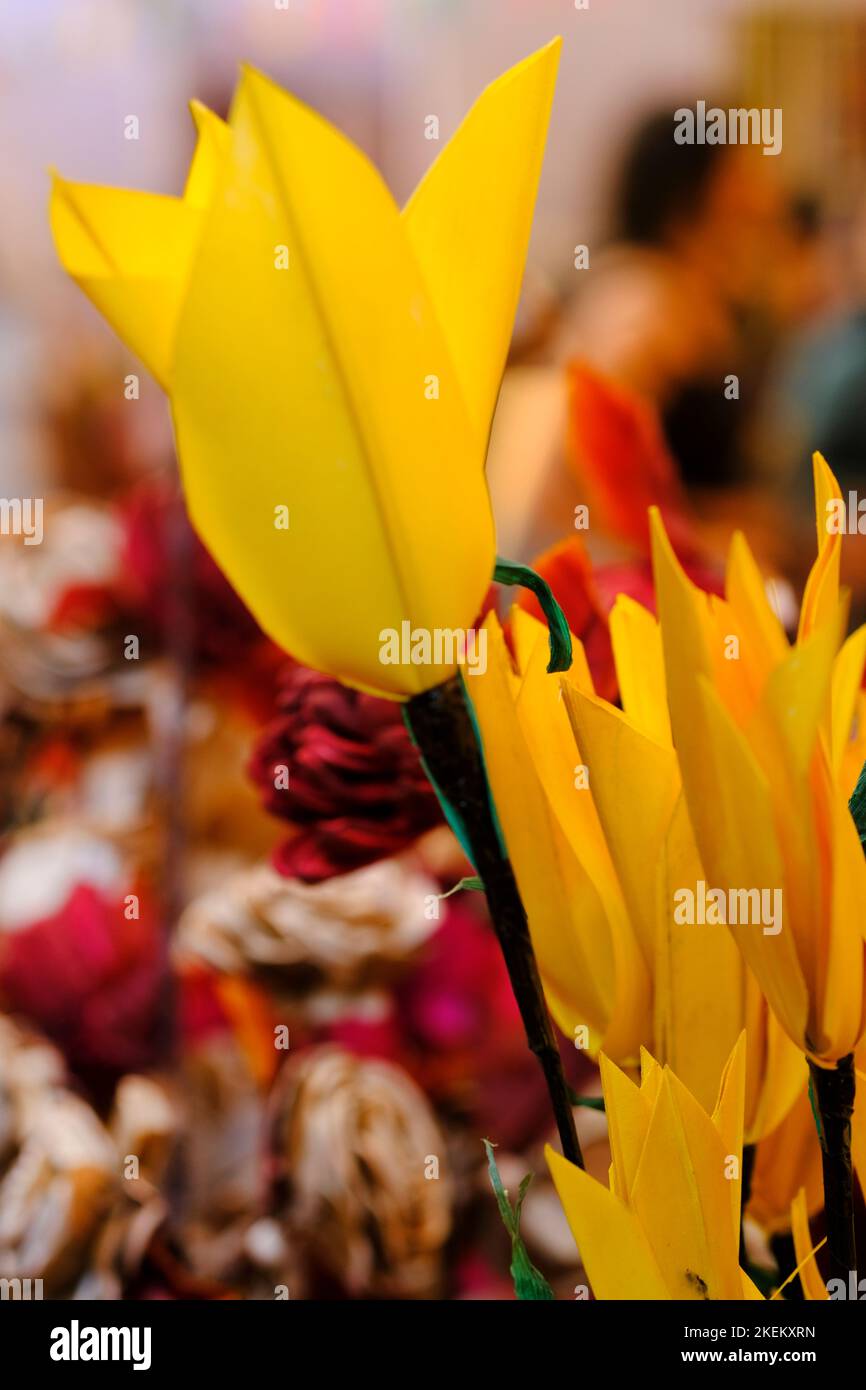 Colorful artificial flowers handcrafted by artisans in India Stock