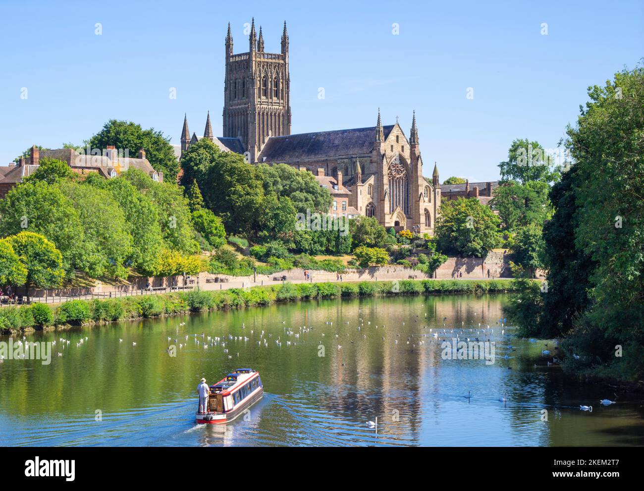 Worcester canal boat on the River Severn at Worcester Cathedral River Severn Worcester Cathedral Worcester Worcestershire England UK GB Europe Stock Photo