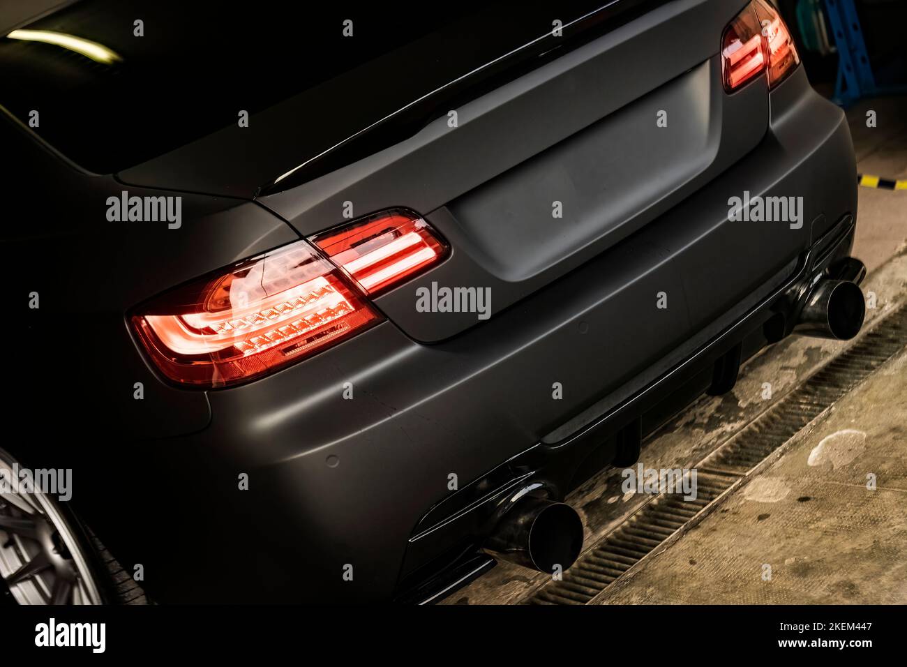 Sport tuned car rear view in the dark detail Stock Photo Alamy