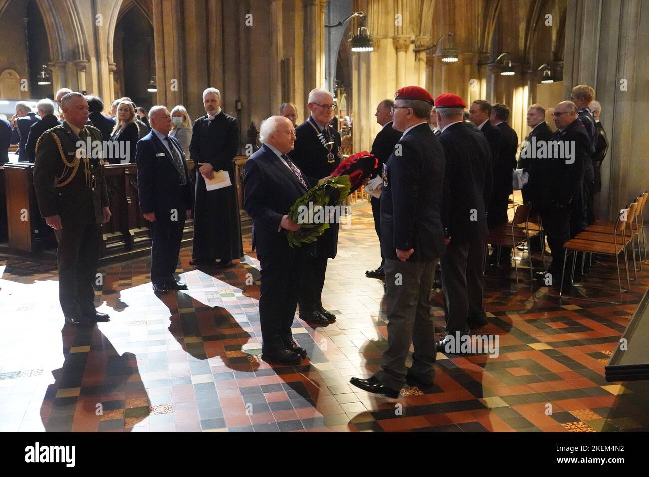 British Legion District President Lt Col Ken Martin and President Michael D Higgins lay wreaths at the Remembrance Sunday service at Saint Patrick's Cathedral in Dublin. Picture date: Sunday November 13, 2022. Stock Photo
