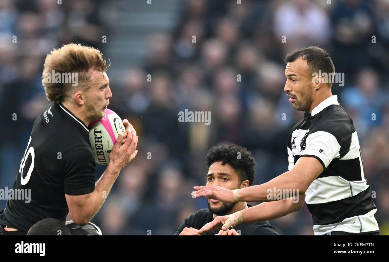 London, UK. 13th November 2022; Tottenham Hotspur Stadium, London, England: Autumn Series international rugby Barbarians versus All Blacks XV; Damian McKenzie of All Blacks XV competes in the air with Dillyn Leyds of Barbarians Credit: Action Plus Sports Images/Alamy Live News Stock Photo