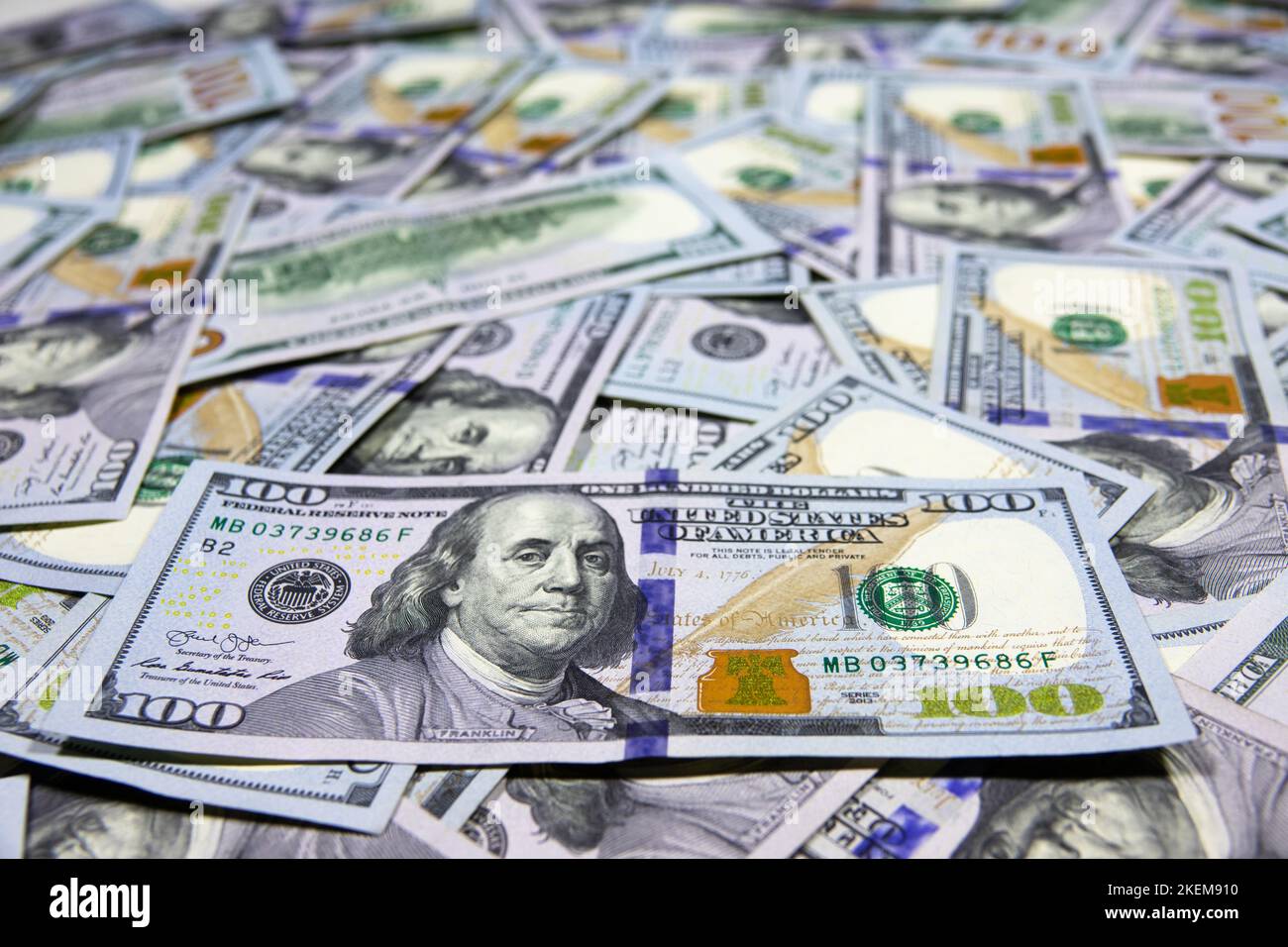 Closeup of one hundred dollar banknotes of American dollars. USA national currency. US dollars background. Banking and financial concept. Shallow dept Stock Photo