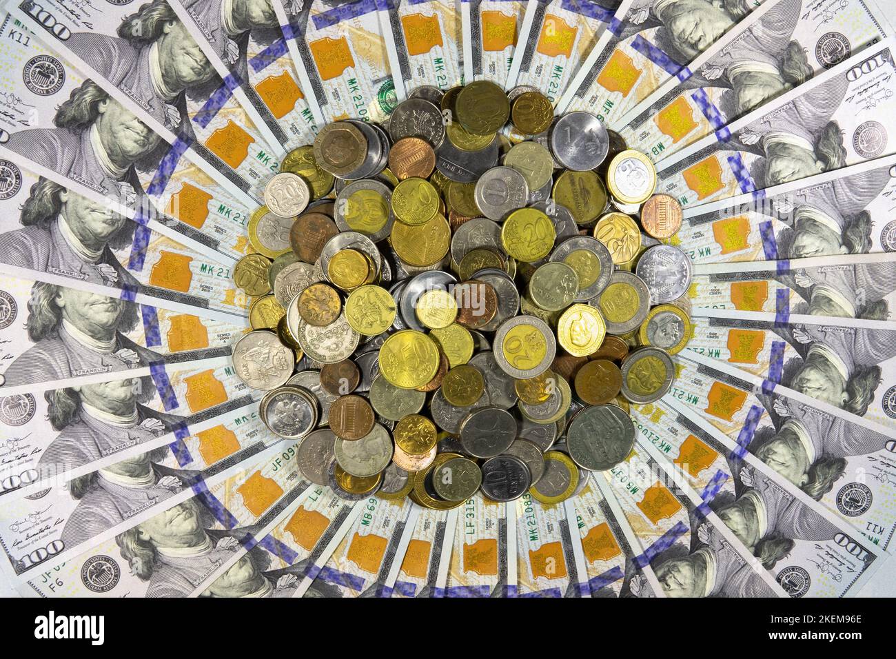 A bunch of different coins from around the world on the background of ...