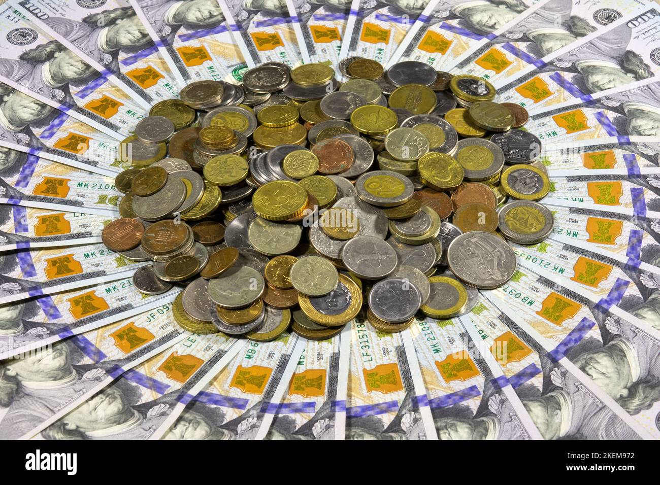 A bunch of different coins from around the world on the background of ...