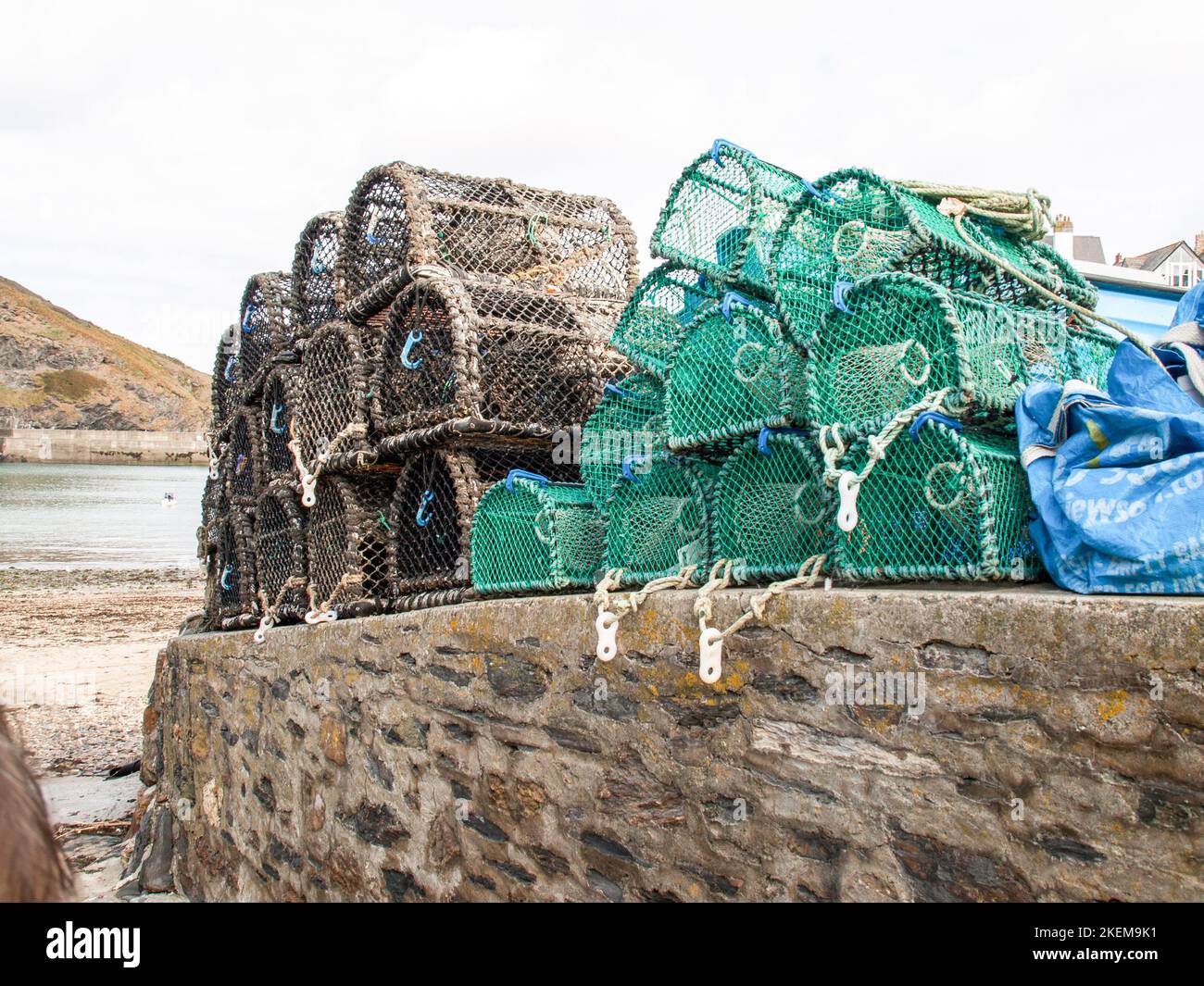 Lobsterpots in the harbour if Port Isaac Stock Photo