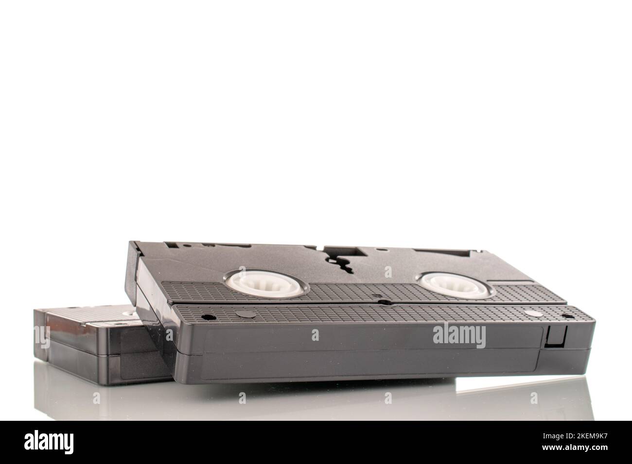 Two video cassettes, macro, isolated on white background Stock Photo