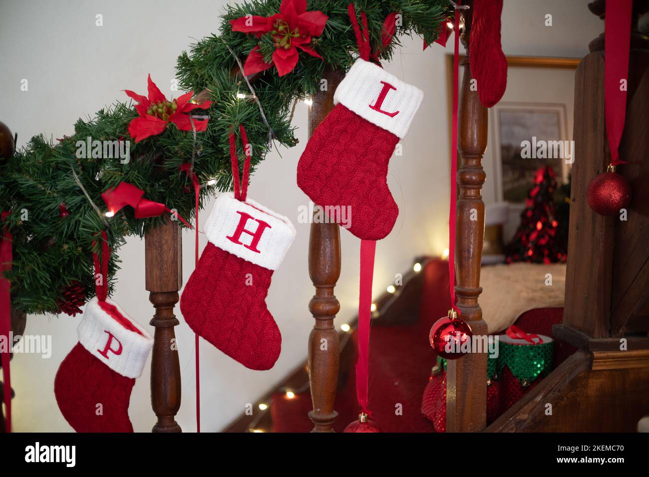 Closed-up red socks hanging for Christmas home decoration Stock Photo