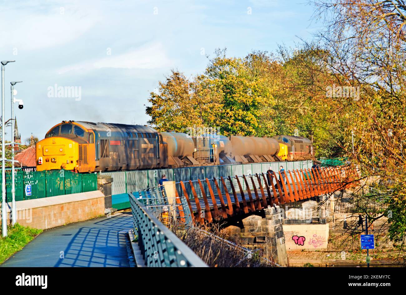 Inter City Liveried Livery Class 37 leading the Rail Head Treatment Train, Scarborough bridge, York, England Stock Photo