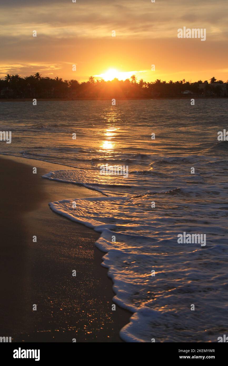 Sunset at the beach Stock Photo - Alamy