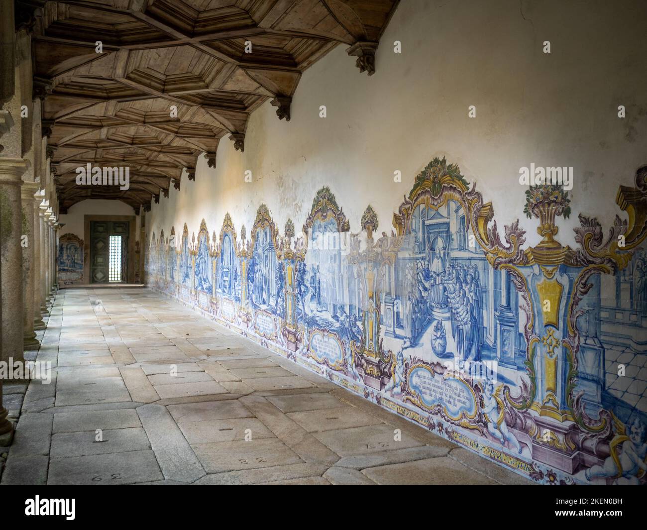 Mosteiro de São Martinho de Tibães cloister, with wooden ceiling and tile covered walls Stock Photo