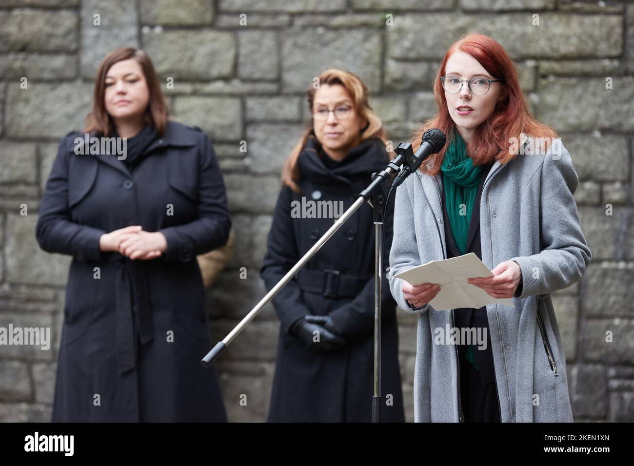 Hamburg, Germany. 13th Nov, 2022. Franciska Henning (r), descendant of resistance fighter Georg Kieras, who was a prisoner in Fuhlsbüttel concentration camp, speaks at a memorial service. Katharina Fegebank (l) Bündnis 90/Die Grünen), Second Mayor of Hamburg, and Carola Veit (SPD), President of the Hamburg Parliament, take part in the wreath-laying ceremony at the International Memorial at the Neuengamme Concentration Camp Memorial in memory of the victims of war and violence. Credit: Georg Wendt/dpa/Alamy Live News Stock Photo