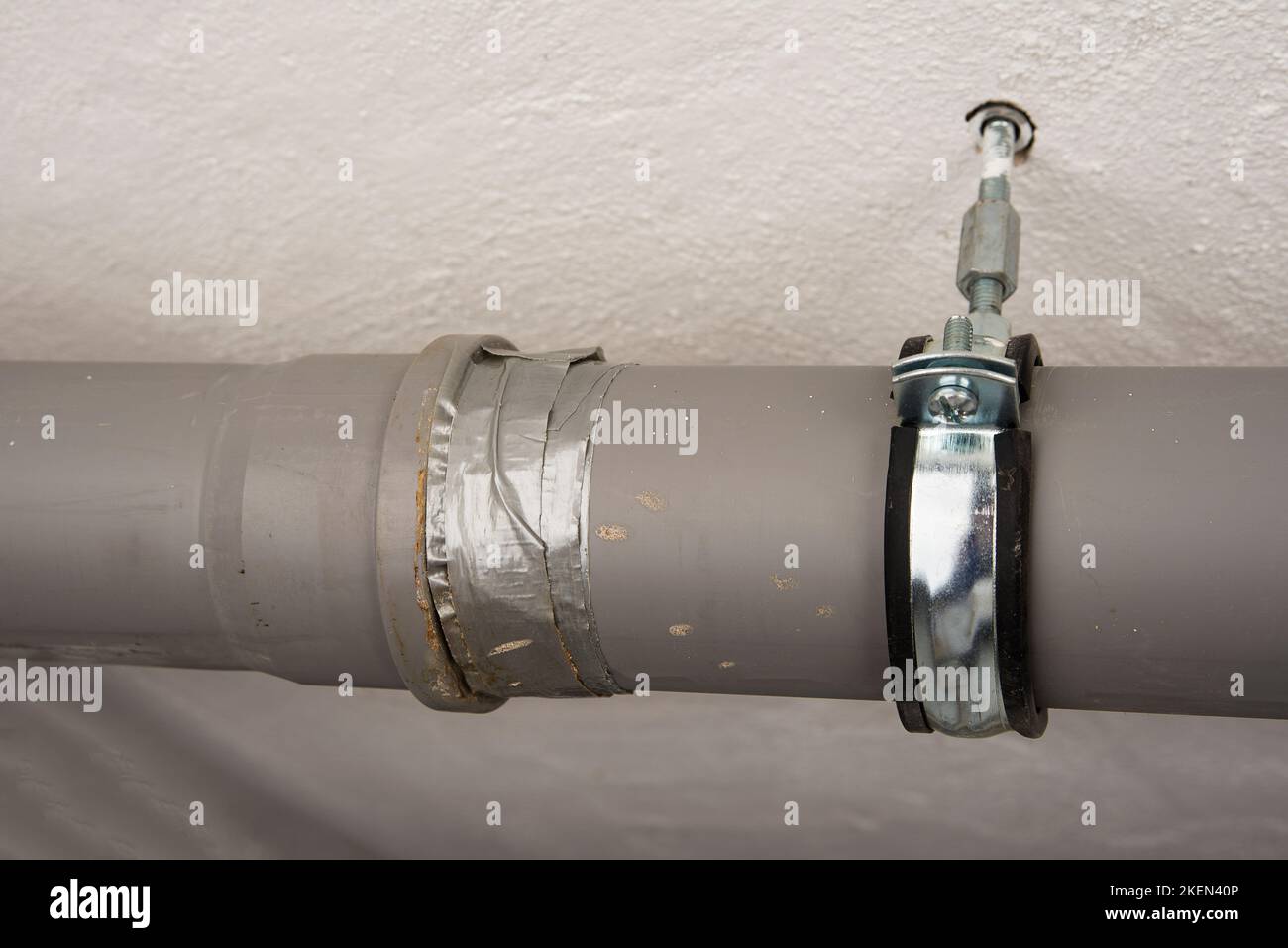 Leaking sewage plastic pipe fixed with a duct tape Stock Photo Alamy