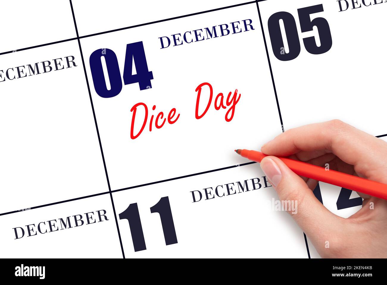 December 4th. Hand writing text Dice Day on calendar date. Save the date. Holiday. Day of the year concept. Stock Photo