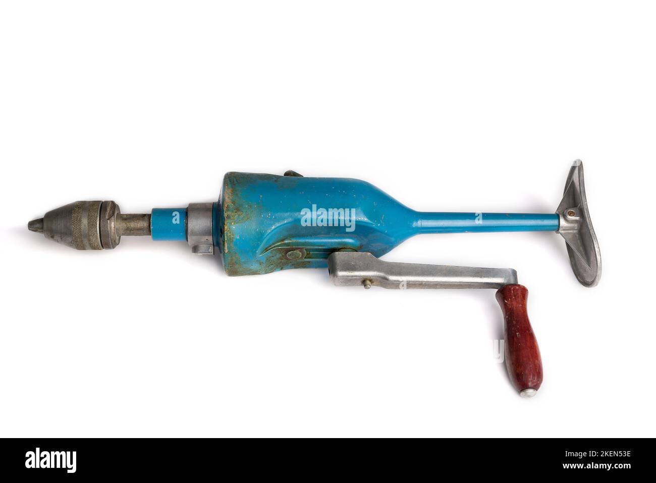Retro drill on the crank on a white Stock Photo