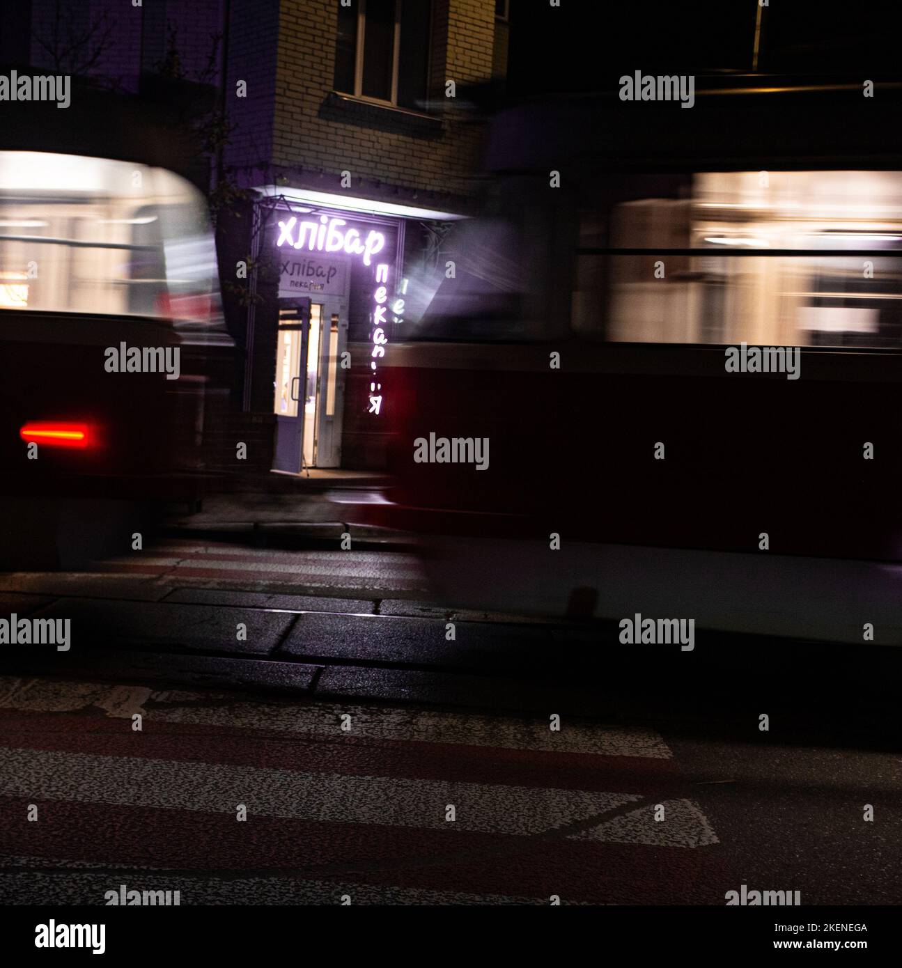 A coffee shop in Kiev during blackouts in Podil (Low-city) area in November 2022 is like an island of urban life with power of generator, grid cut off Stock Photo