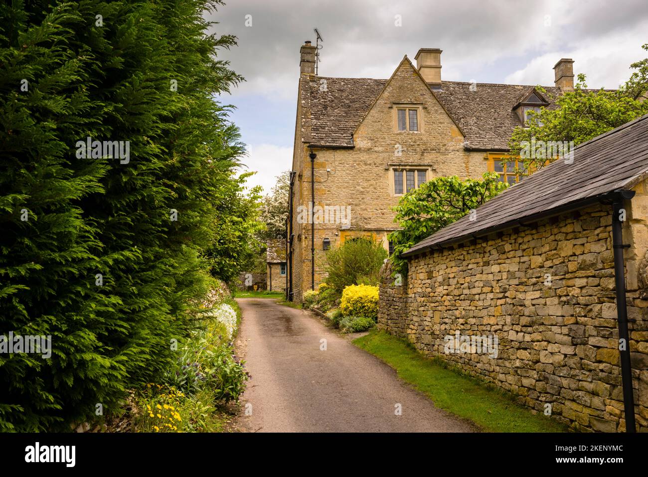 Stone houses with mullioned windows in Broadwell, England along the