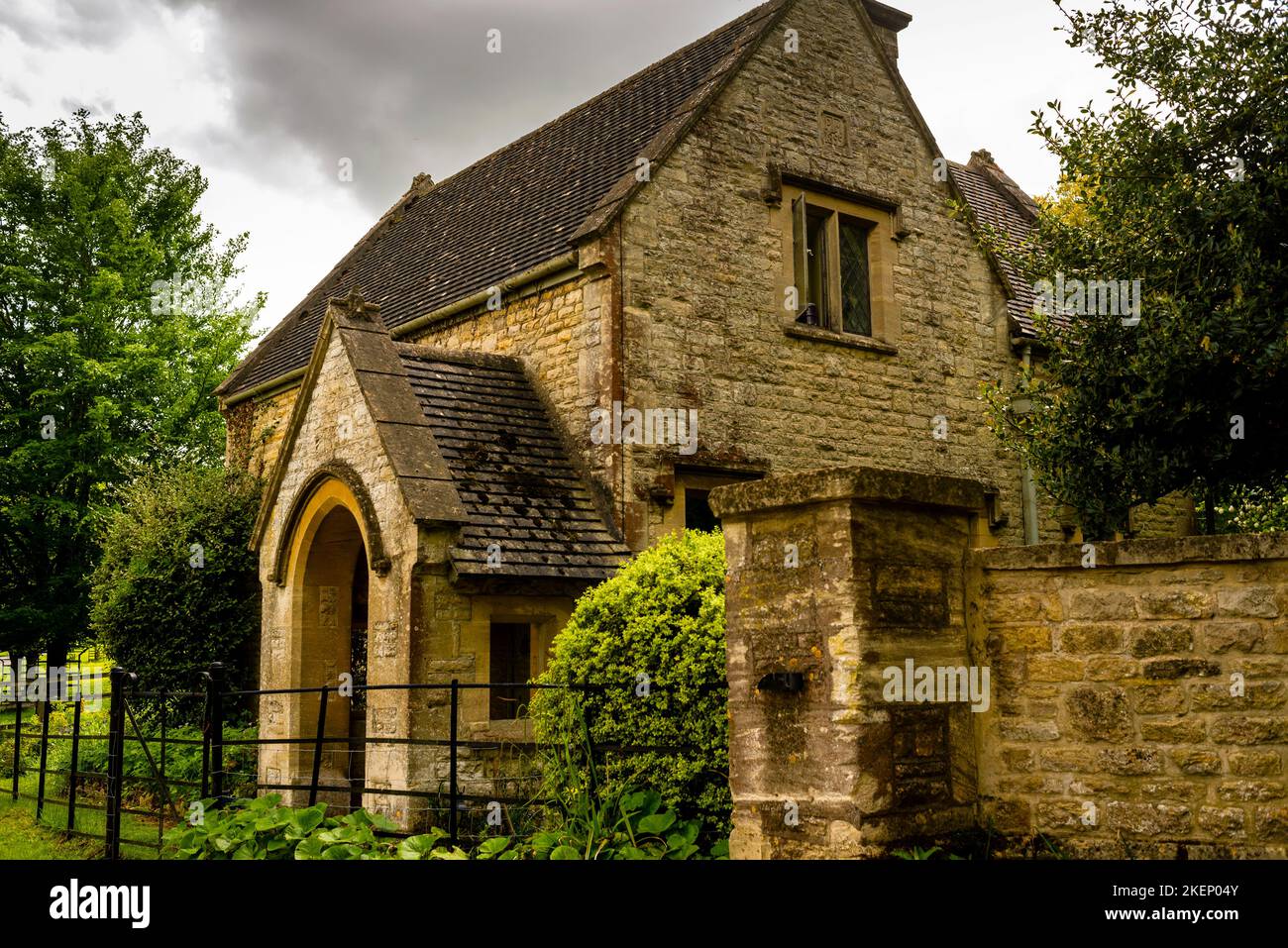 Arched vestibule in a honey colored stone cottage in Broadwell, England