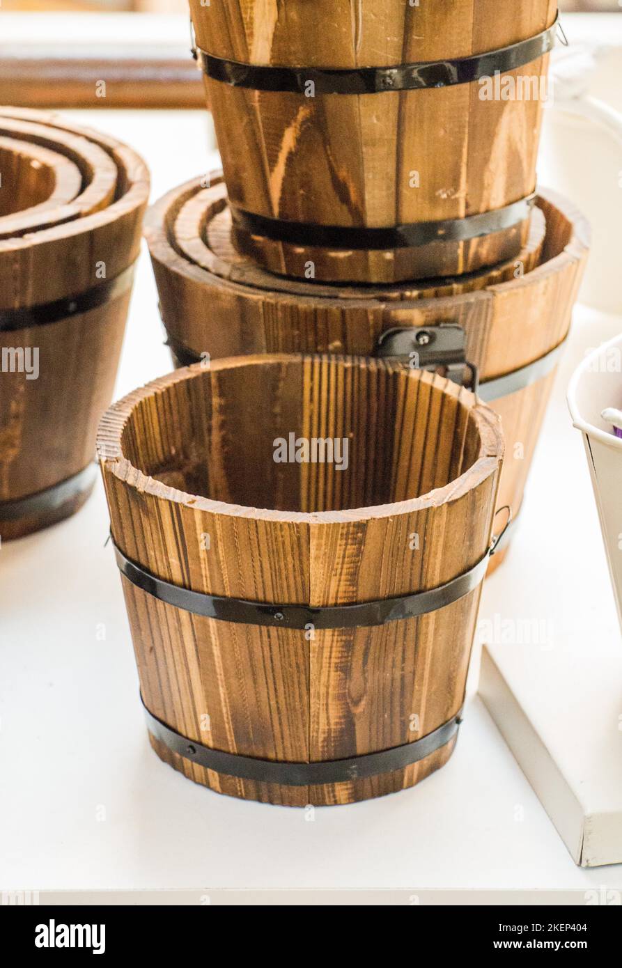Set of buckets made of wood in a market place Stock Photo Alamy