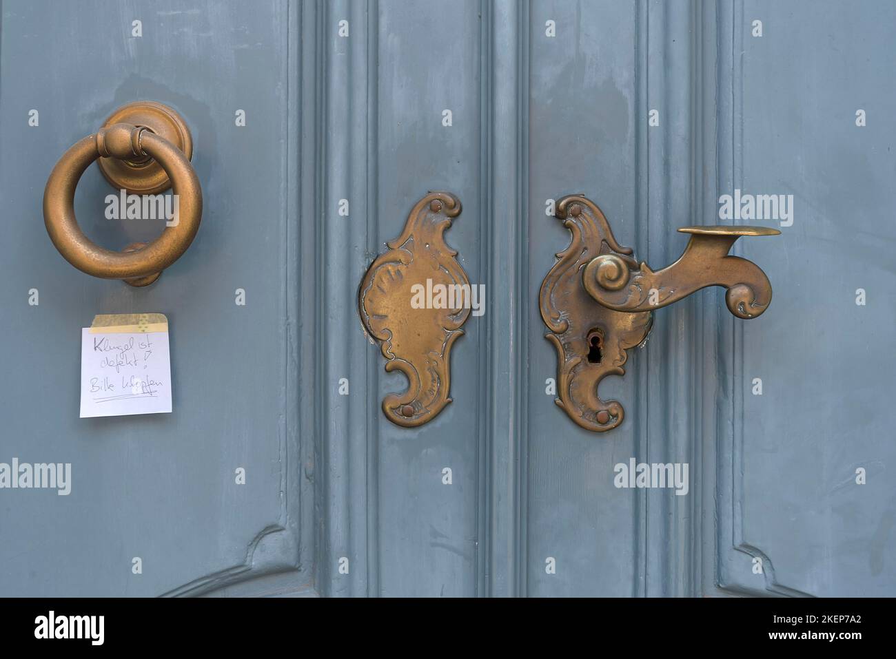 Historic brass door lock and knocker, Lueneburg, Lower Saxony, Germany
