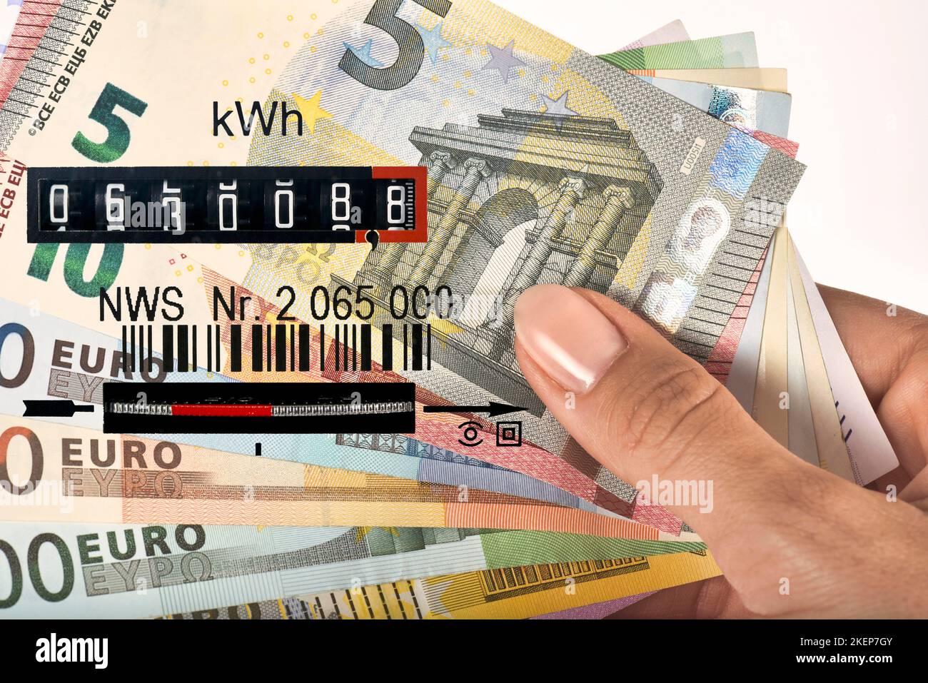 Symbolic image Energy costs, electricity meter, money trays EURO Stock Photo
