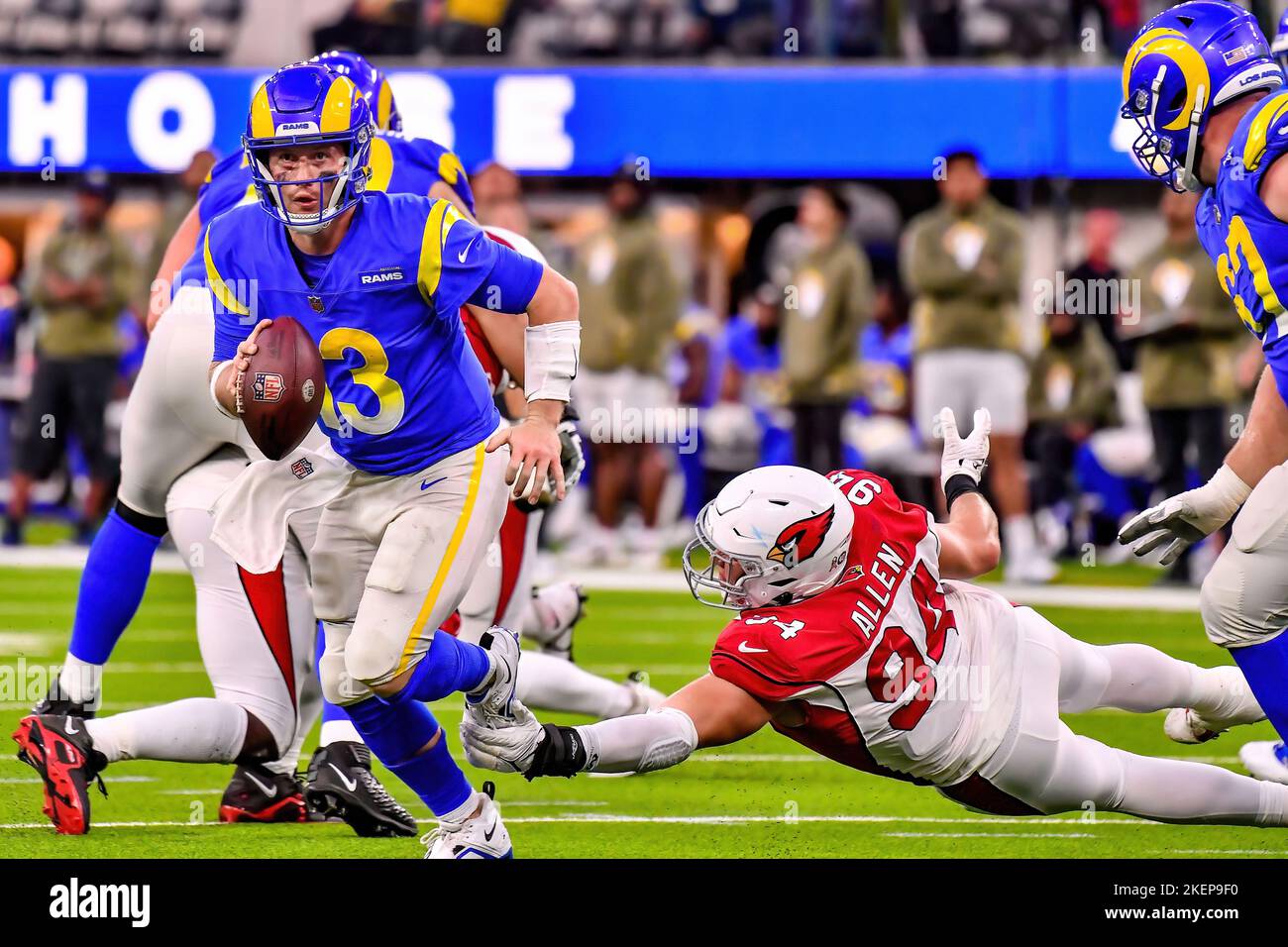 Inglewood, CA. 13th Nov, 2022. Los Angeles Rams quarterback John Wolford #13 scarambles and is brought down by Arizona Cardinals defensive end Zach Allen #94 in action in the fourth quarter during the NFL football game against the Arizona Cardinals.Mandatory Photo Credit: Louis Lopez/Cal Sport Media/Alamy Live News Stock Photo