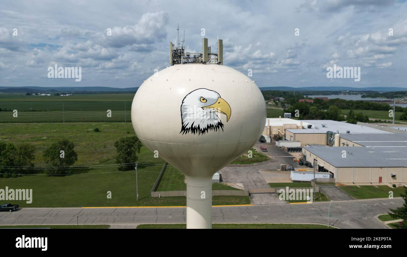 Prarie Du Sac Water tower in Wisconsin USA during Summer of 2022 in a green field Stock Photo