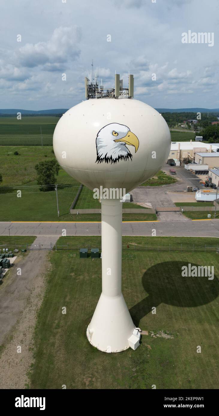 Prarie Du Sac Water tower in Wisconsin USA during Summer of 2022 in a green field Stock Photo