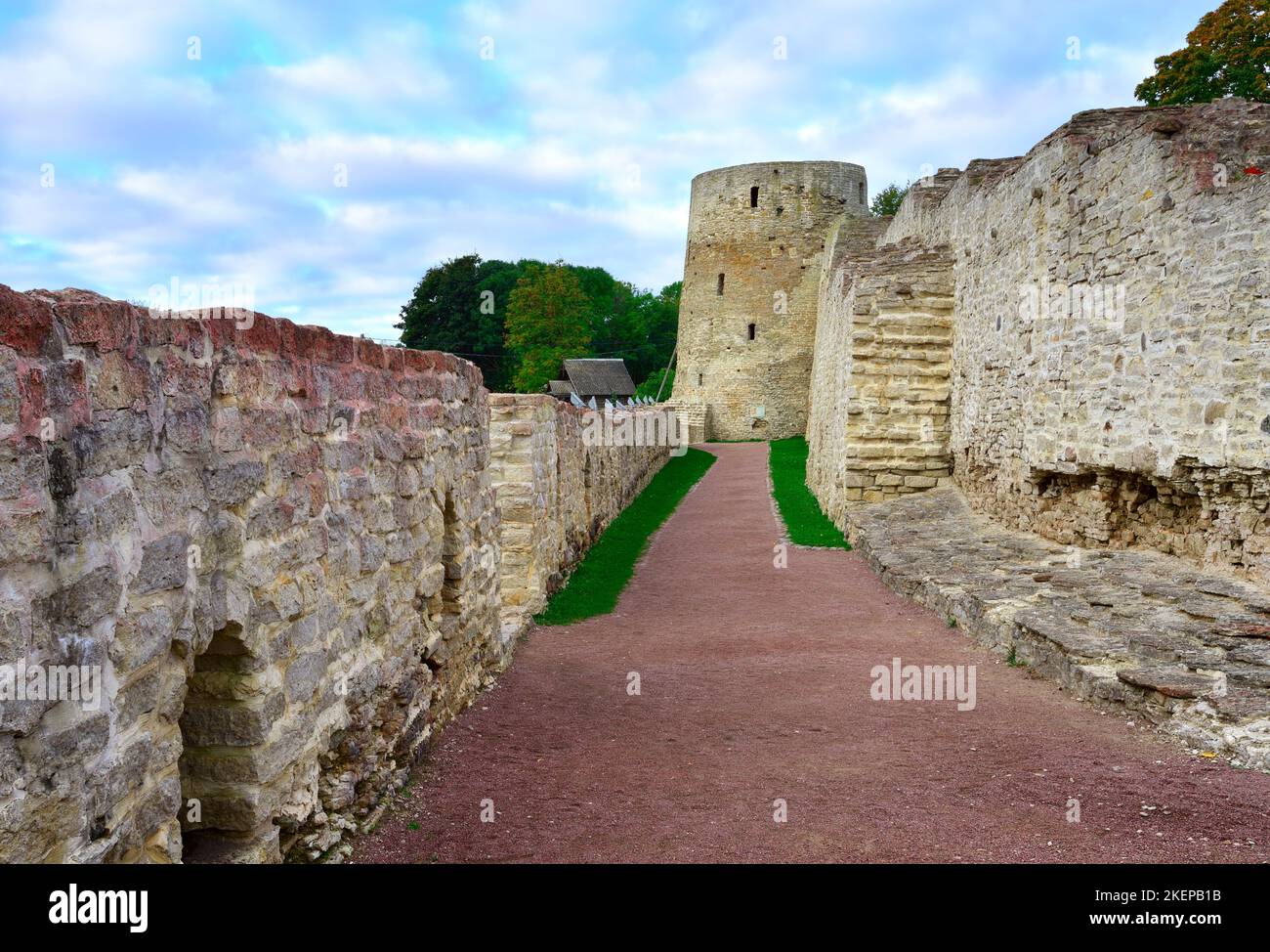 The old Izborsk stone fortress. The defensive corridor at the fortress walls, an architectural monument of the XIV-XVII centuries. Izborsk, Pskov regi Stock Photo