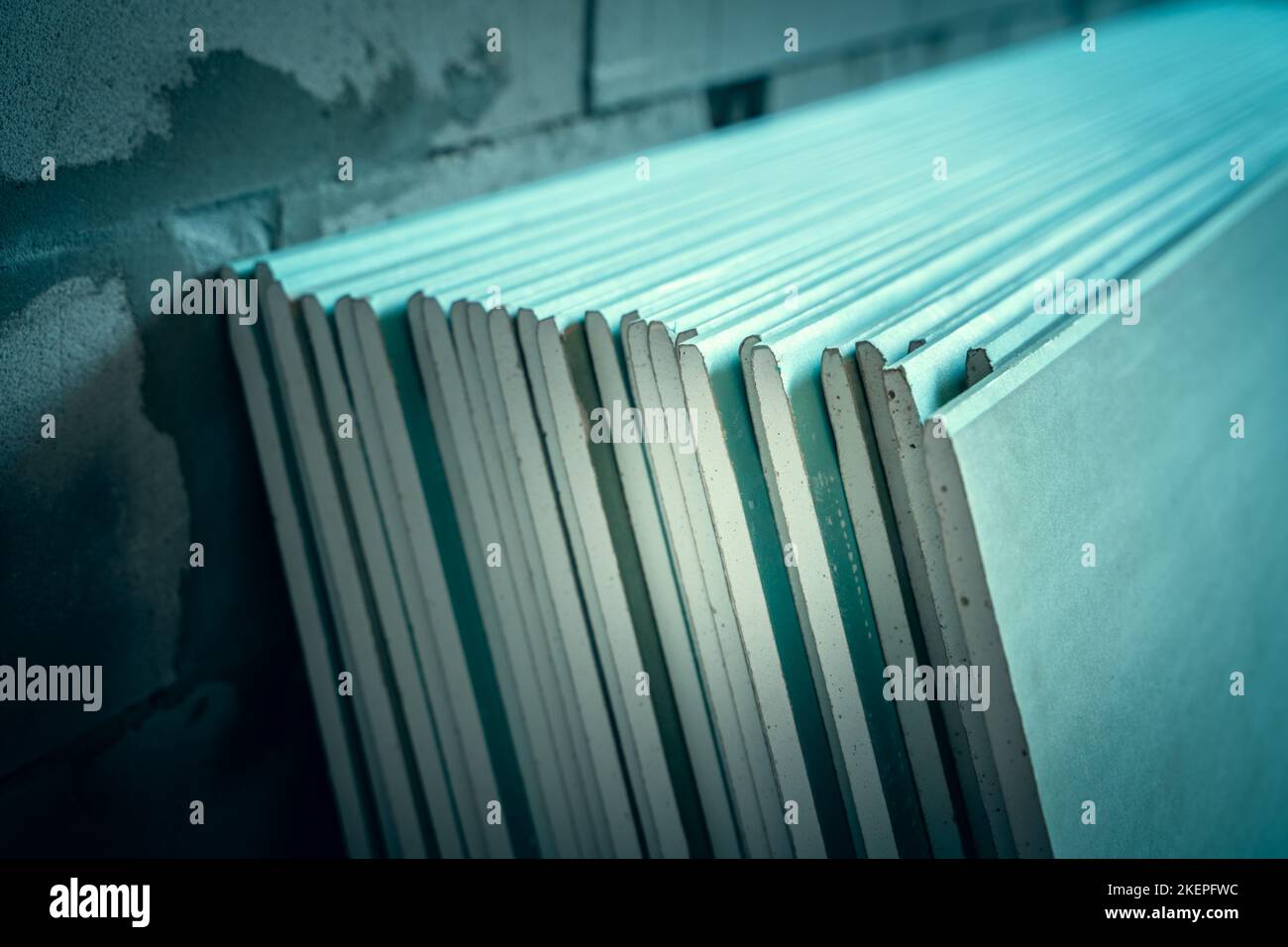 A lot of sheets of moistureresistant drywall closeup at a