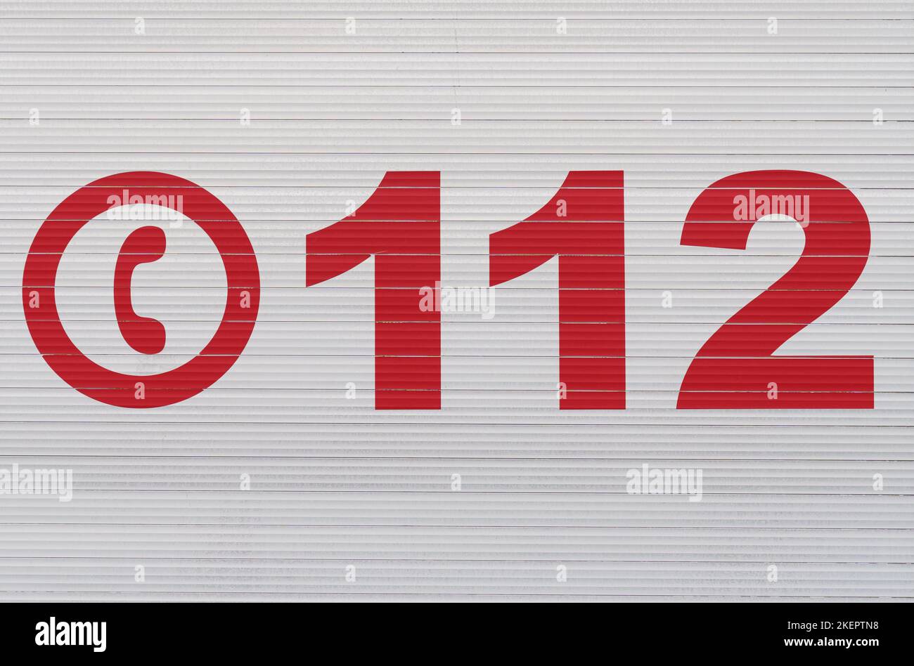 Security. Emergency telephone number 112 on the car door Stock Photo Alamy