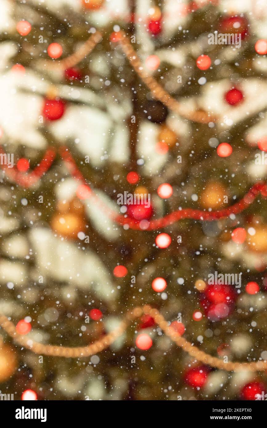 Part of a Christmas tree decorated with lights - soft focus Stock Photo