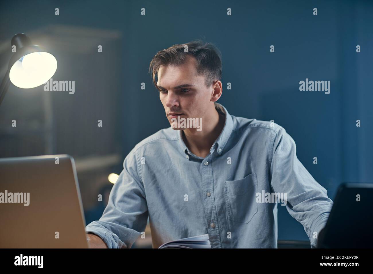 young businessman writing down his ideas in a notebook. Stock Photo