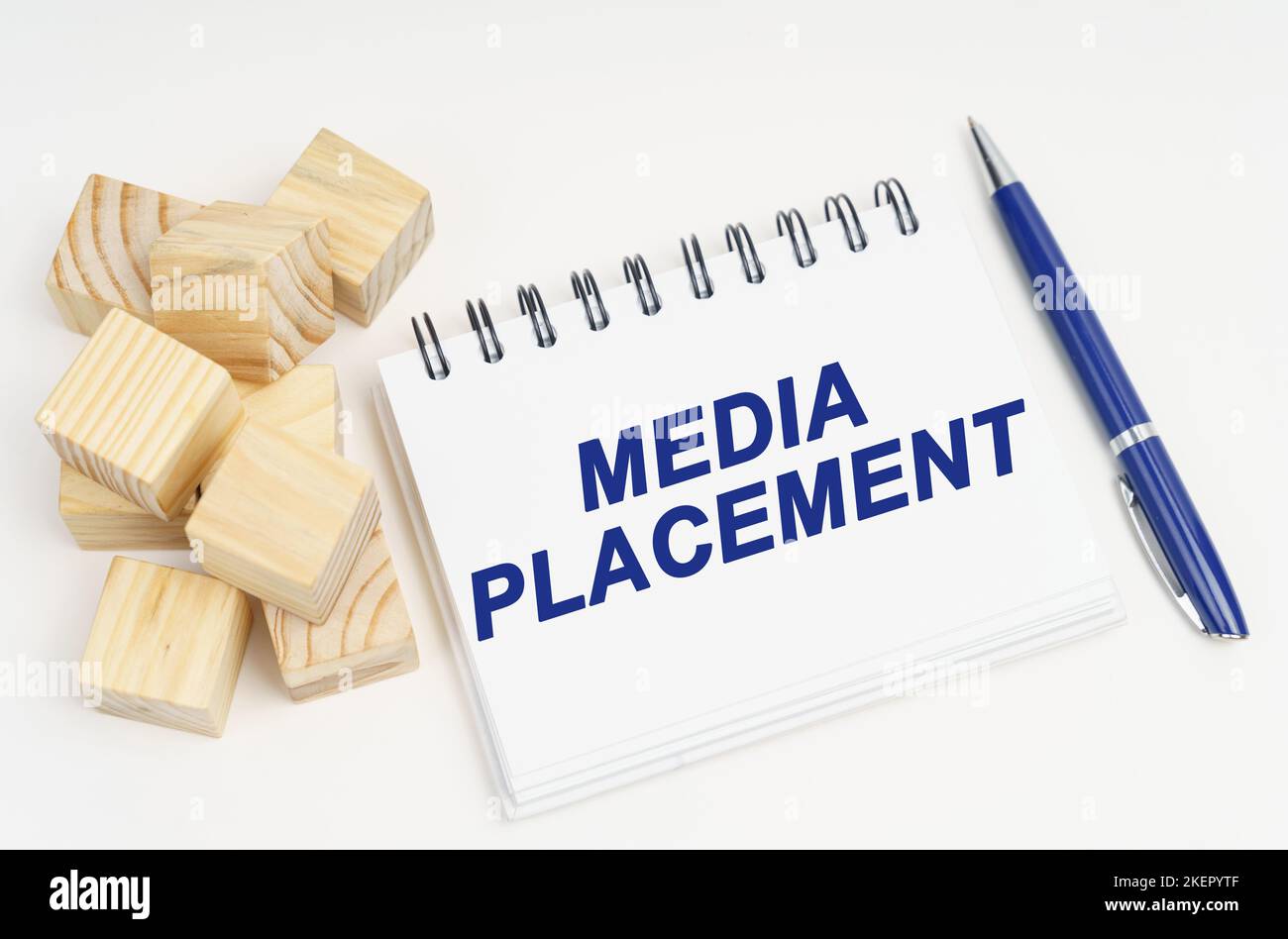 Internet and security concept. On the table are cubes, a pen and a notebook with the inscription -Media Placement Stock Photo