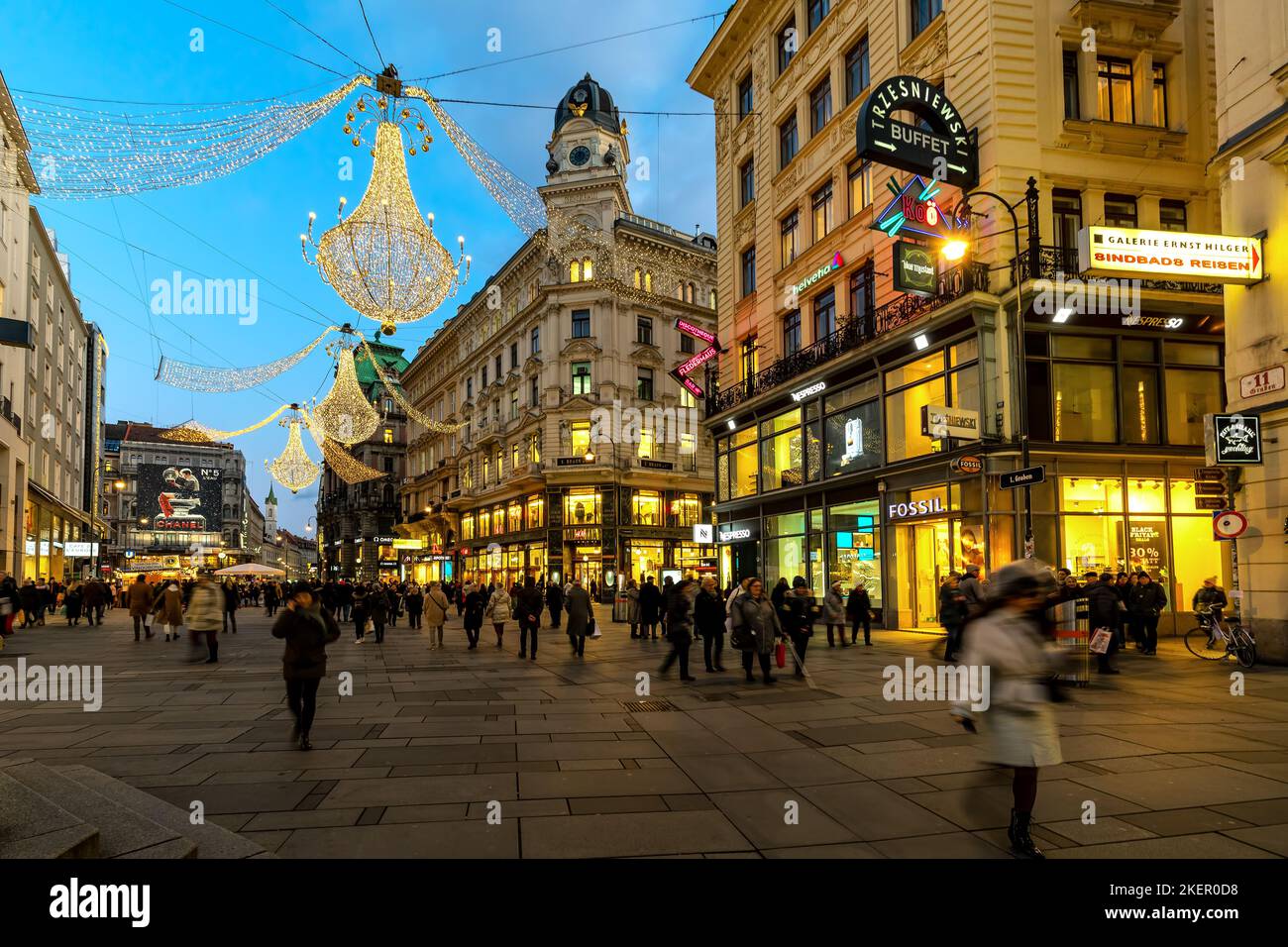 People walking on evening Graben street - one of the main and famous pedestrian streets in Vienna, Austria. Stock Photo