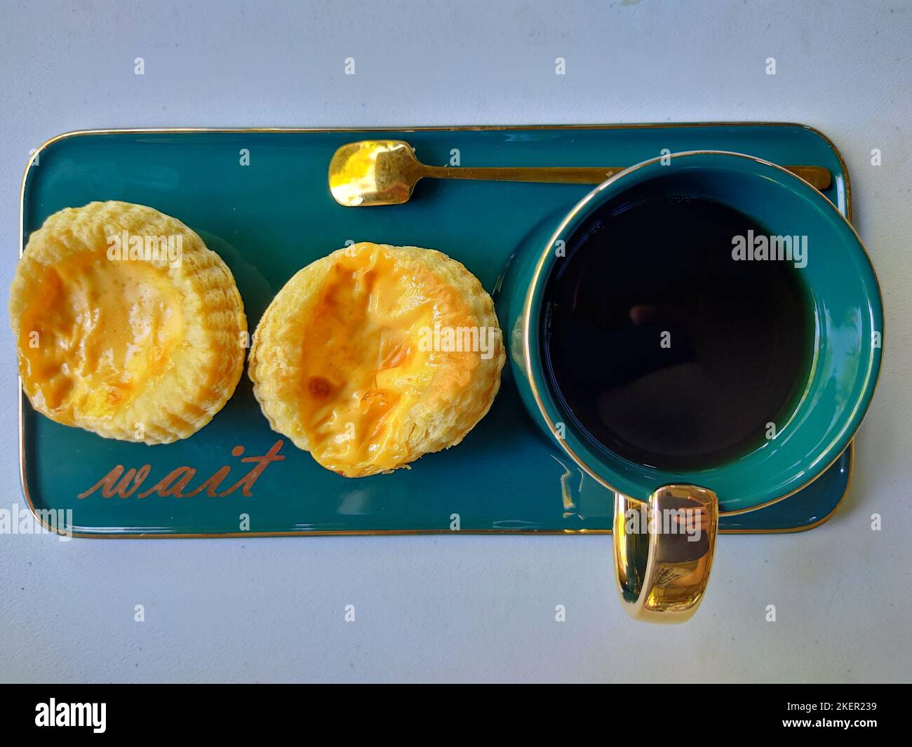 egg tart and coffee at teatime Stock Photo