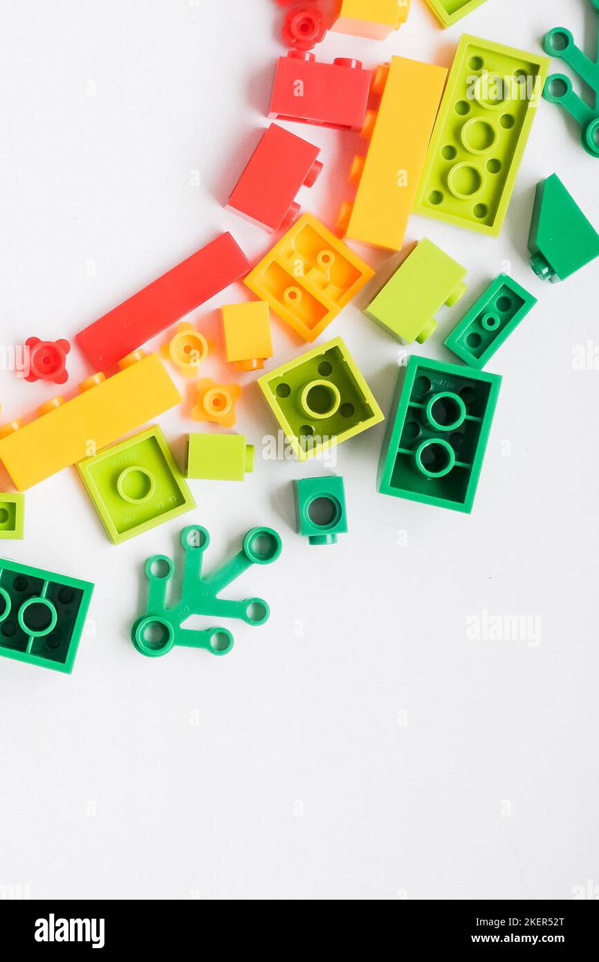 Multicolored plastic building blocks of the designer. Educational developing toys background.copz space Stock Photo