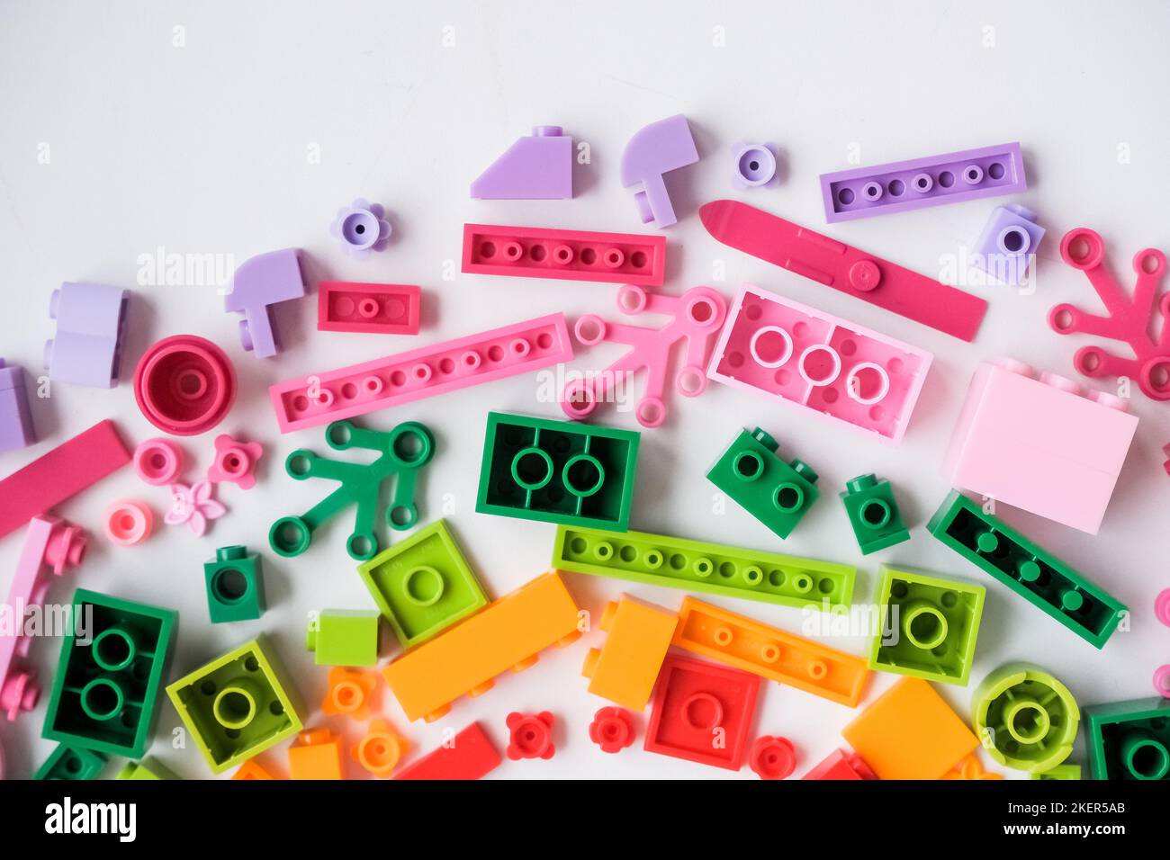Multicolored plastic building blocks of the designer. Educational developing toys background.copz space Stock Photo