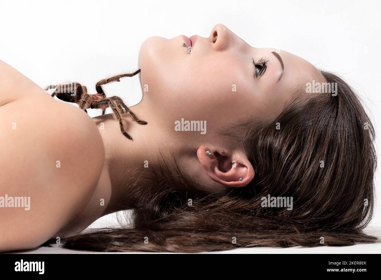 woman and tarantula Stock Photo