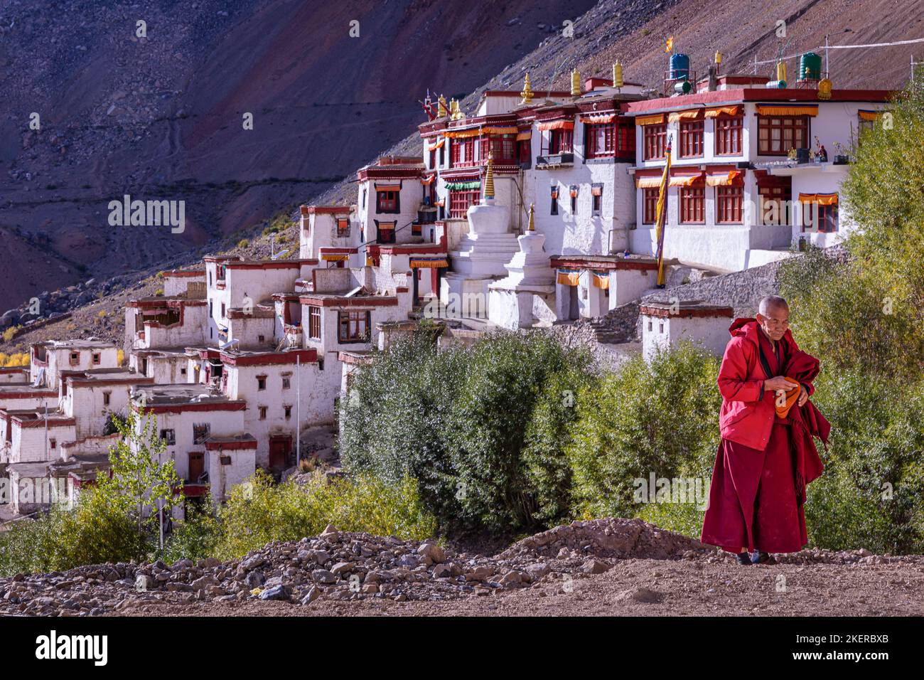 Elderly monk in front of Lingshed, Ladakh, India Stock Photo