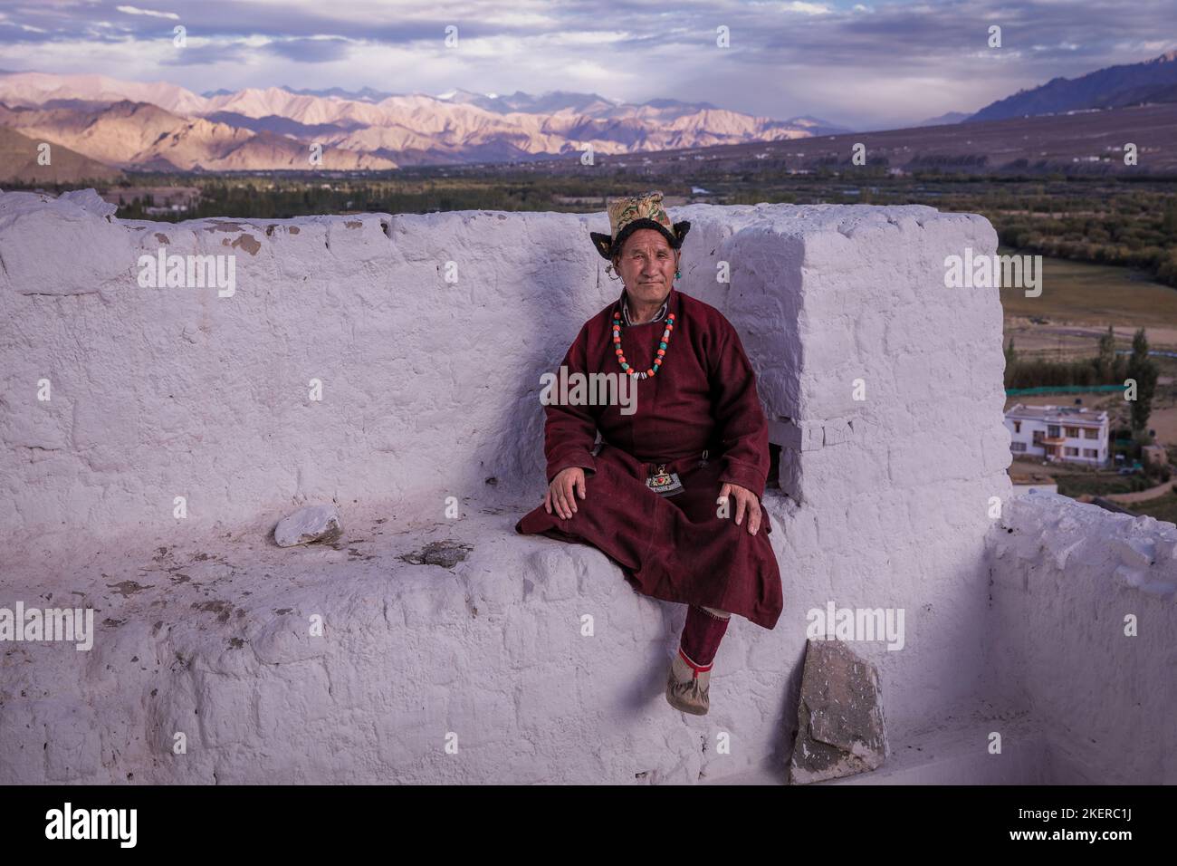 Elderly man in traditional Ladakhi clothes, Spituk Monastery (Gompa), Leh district, Ladakh, India Stock Photo